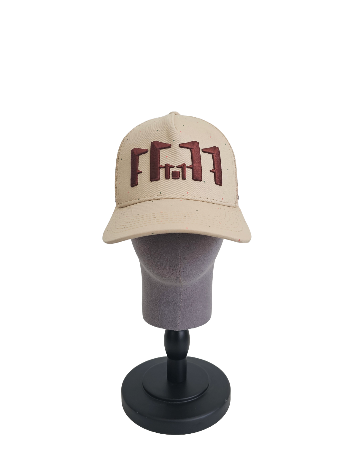 A front view of a beige snapback trucker cap on a mannequin head with an embroidered brown 11.11 number logo