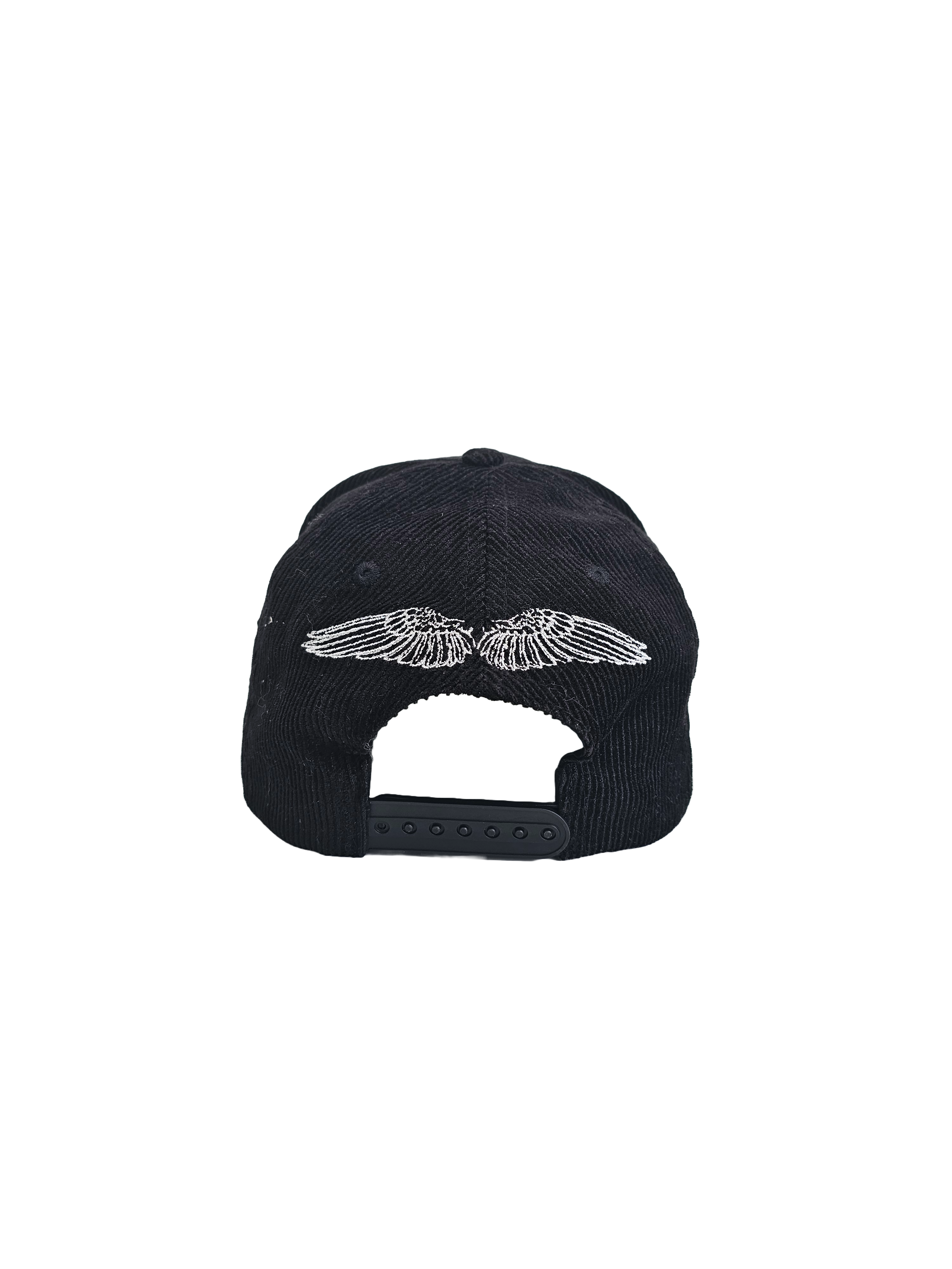 Back view of black corduroy Palestine snapback hat with embroidered white angel wings above adjustable strap, pro-Palestine streetwear with symbolic design and snapback closure.
