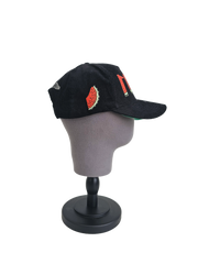 Side view of black corduroy snapback hat with embroidered 11:11 logo and watermelon slice in the shape of the Palestinian land, pro-Palestine streetwear cap symbolizing solidarity, featuring red, green, white, and black accents.